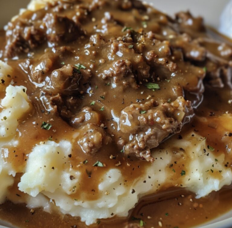 Hearty Ground Beef And Gravy Over Fluffy Mashed Potatoes Recipe